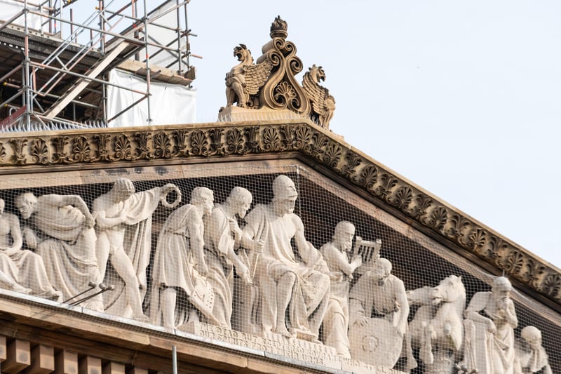 The Anicent Greek figures that look out over the Flag Market have had seven stone of bird dirt removed from them