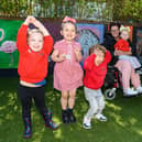 (l-r) Amelia Fairchild, Maisie Daniels, Daniel Martinez Inigo and Esmé Jones with artist Kirsty Rea and the zoo mural at Ashcroft Nursery in Blackpool. Photo: Kelvin Stuttard