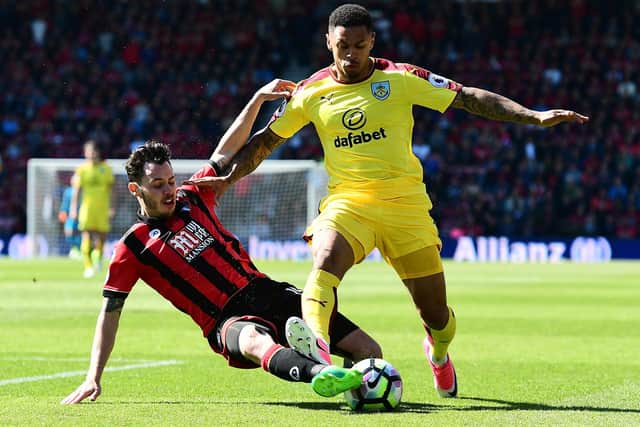 BOURNEMOUTH, ENGLAND - MAY 13: Charlie Daniels of AFC Bournemouth tackles Andre Gray of Burnley during the Premier League match between AFC Bournemouth and Burnley at Vitality Stadium on May 13, 2017 in Bournemouth, England.  (Photo by Alex Broadway/Getty Images)