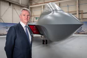 Charles Woodburn, chief executive of BAE Systems, pictured with the full-sized mock-up of the 6th Generation combat aircraft, the Tempest at Warton.