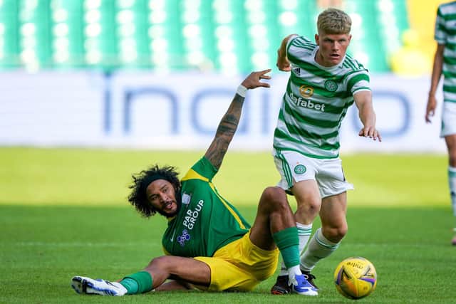 Preston North End midfielder Izzy Brown battles with Celtic's Scott Robertson during the pre-season friendly match at Celtic Park