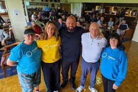 Organisers and competitors of the Annual Golf Day for Rainbow Hub