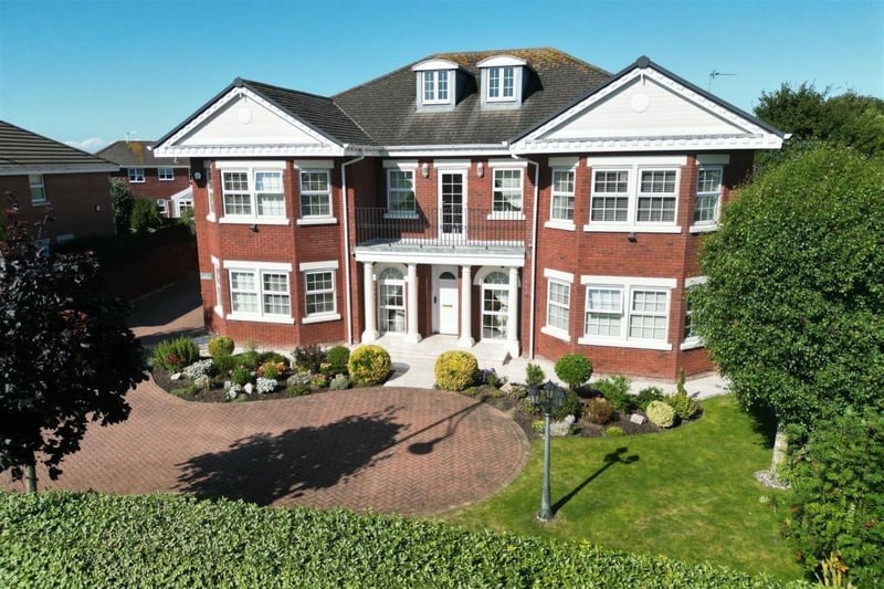 This stunning five bedroomed detached property known as 'The Lexington' has a commanding position on Lytham's prestigious Cypress Point on Grand Manor Drive, directly facing the Village Green with it's landscaping and water features. It's listed for sale with John Arden Estate Agents in Lytham and is on the market for £1,195,000