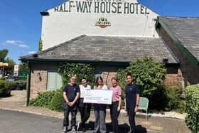 Baby Beat’s Joanna Allitt (third left) receives the fun day donation from, left to right, John Healy of KKC UK, Halfway House landlady Stella Gibbs, midwife and event organiser Catherine Garratt and Vicky Harrison, also of KKC UK