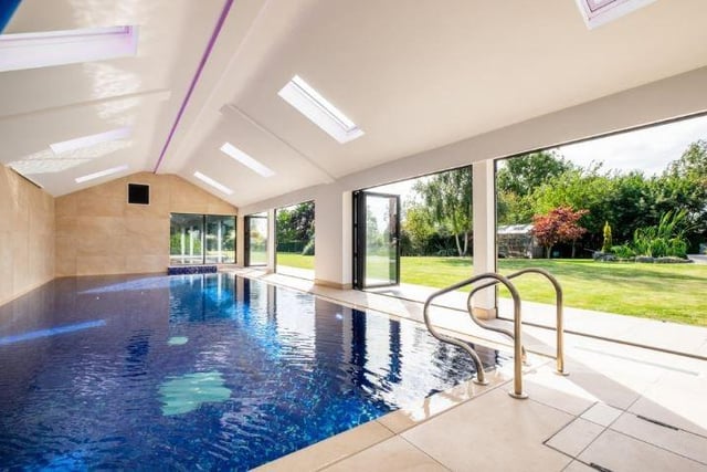 Agents say this £2.395m home near the centre of Wrea Green "isn’t just a property, it’s a lifestyle".
As well as the pool, there's six bedrooms and an acre of land.