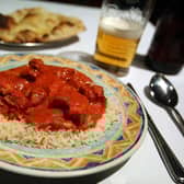 The price of chicken tikka masala is hitting Brits in the pocket.
