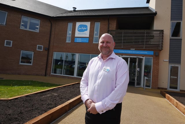 Centre director Chris Walbank pictured as staff and patients at Sue Ryder Neurological Care Centre, Fulwood, Preston, celebrate their second anniversary in the new building, with a BBQ garden party.