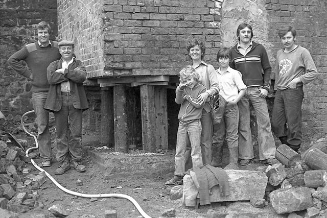Steeplejack Fred Dibnah (second from left) with locals at the scene of the chimney being toppled. Picture courtesy of Keith Taylor.