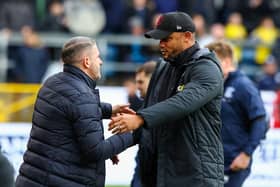 Burnley manager Vincent Kompany greets Preston North End manager Ryan Lowe before the match