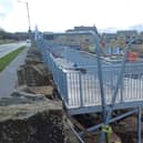 The controversial metal ramp/ walkway that has been constructed at the entrance to the new housing development The Calders in Cliviger