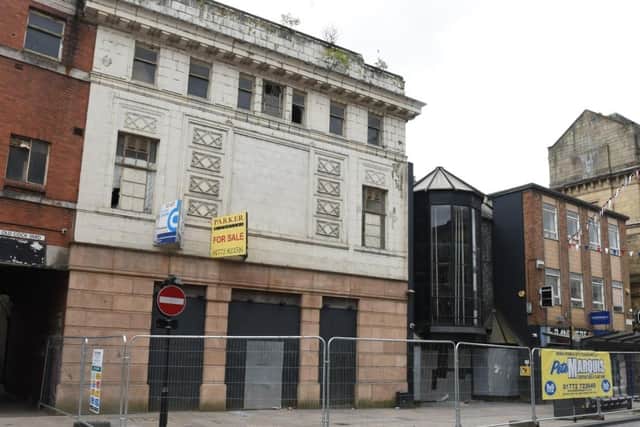 The front of the former Odeon Cinema on Church Street will remain unchanged - for now - for fear that an open chasm would damage nearby conservation areas