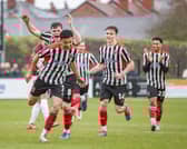Kristi Montgomery (front) celebrates his goal against Spennymoor Town with from the left, Mike Calveley, George Horbury and Warren Clarke (photo: David Airey/dia_images)