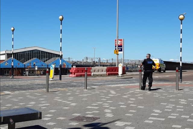 Police threw a 100-metre exclusion zone around the station as bomb squad officers examined the package.