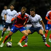 Swansea City's Jay Fulton shields the ball from Preston North End's Ben Whiteman