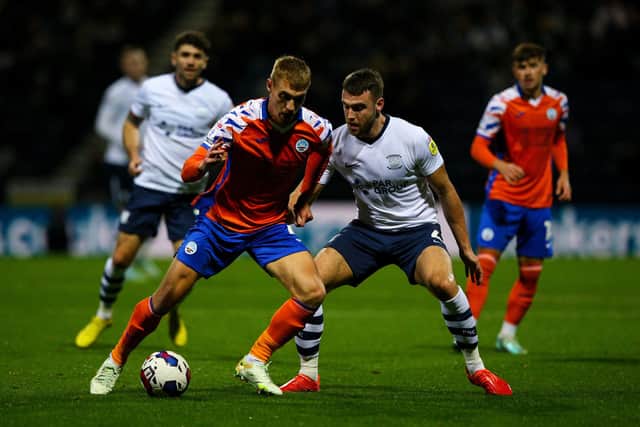 Swansea City's Jay Fulton shields the ball from Preston North End's Ben Whiteman