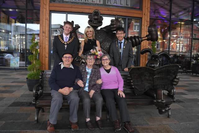 Photo Neil Cross;
The Mayor of Preston presents flowers to cafe worker Maureen Davenport who saved Susan Seaton's life with CPR