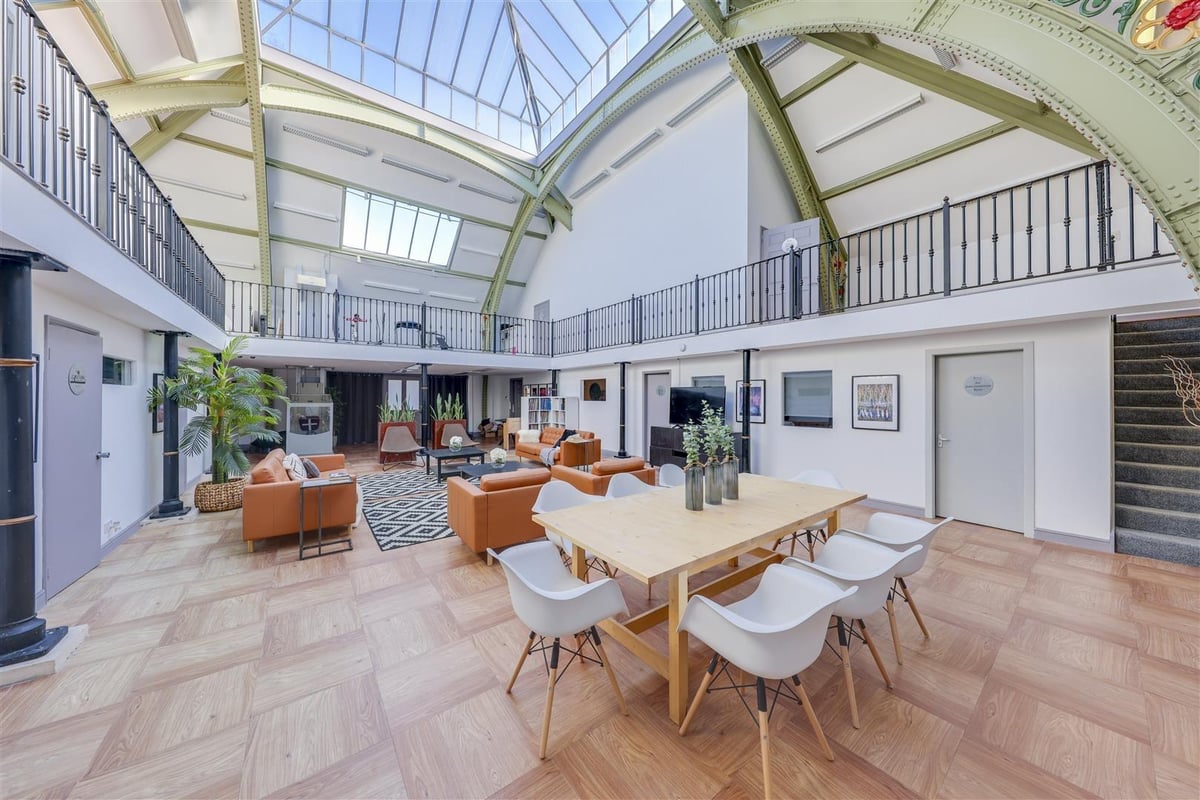 Former school hall converted into stunning nine-bed home hits the market for just £280k