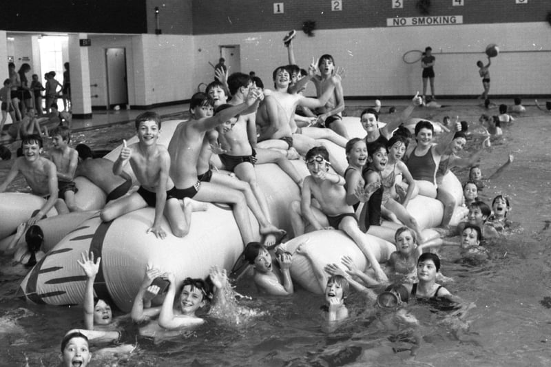 A crowded swimming pool as children enjoy Fun Swim time at Fulwood Leisure Centre during the summer holidays