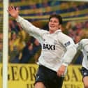 Jon Macken celebrates his goal in a Preston North End v Cambridge United game, followed closely by Kurt Nogan. Another club legend, Jon Macken joined Preston North End for £250,000 in 1995 and managed to notch up 63 goals in 189 league matches until his departure to Manchester City in 2002. At the time his club transfer fee was the highest the club had ever seen