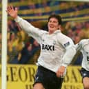 Jon Macken celebrates his goal in a Preston North End v Cambridge United game, followed closely by Kurt Nogan. Another club legend, Jon Macken joined Preston North End for £250,000 in 1995 and managed to notch up 63 goals in 189 league matches until his departure to Manchester City in 2002. At the time his club transfer fee was the highest the club had ever seen