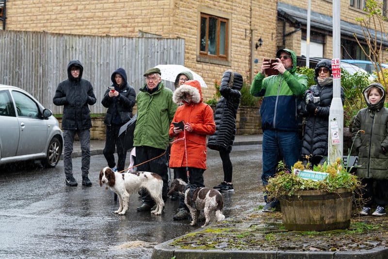 Crowds brave the rain awaiting the arrival of Princess Anne to Trawden. Photo: Kelvin Lister-Stuttard