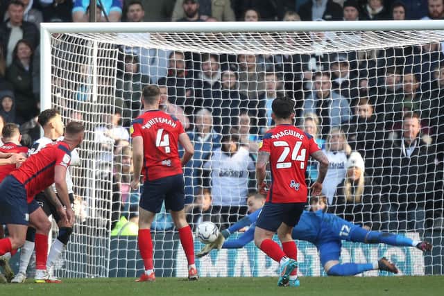 Preston North End goalkeeper Daniel Iversen makes a save just before Derby County's winner