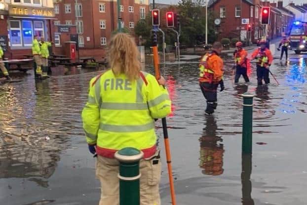 Firefighters at the scene when the worst of the flooding hitr Kirkham