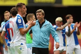 Jon Dahl Tomasson and his Blackburn Rovers players 