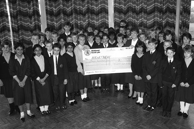 In 1987 pupils from Tulketh High School make a presentation of £400 to Heartbeat