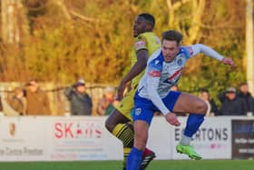 Danny Forbes wins an aerial duel against Guiseley (photo: Ruth Hornby)