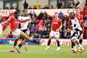 Yann Songo'o scores Morecambe's consolation goal against Salford City Photo: Jan Kruger/Getty Images