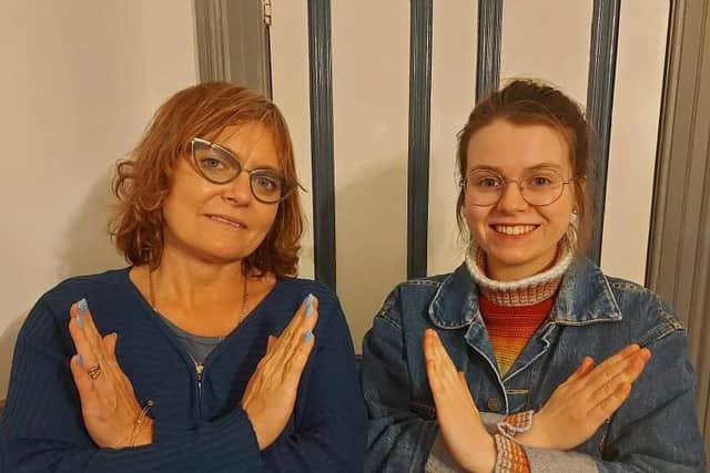 Mum and daughter Blackpool Soroptimist members, Janine (left) and Monica Brownwood demonstrating the ‘Solidarity Strike’ for the #BreakTheBias campaign