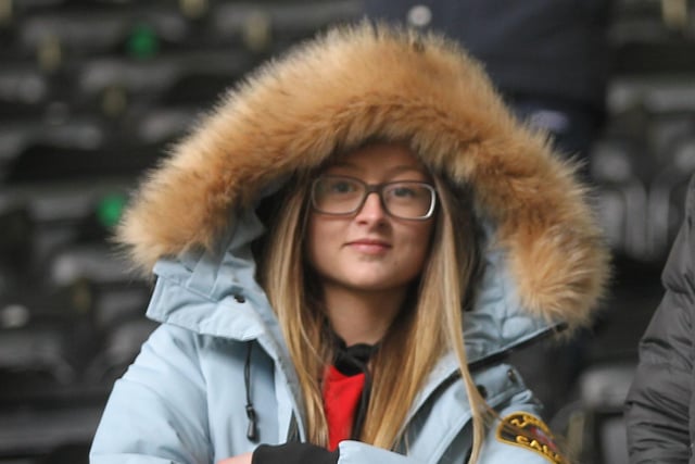 A PNE fan keeps out the chill at Derby