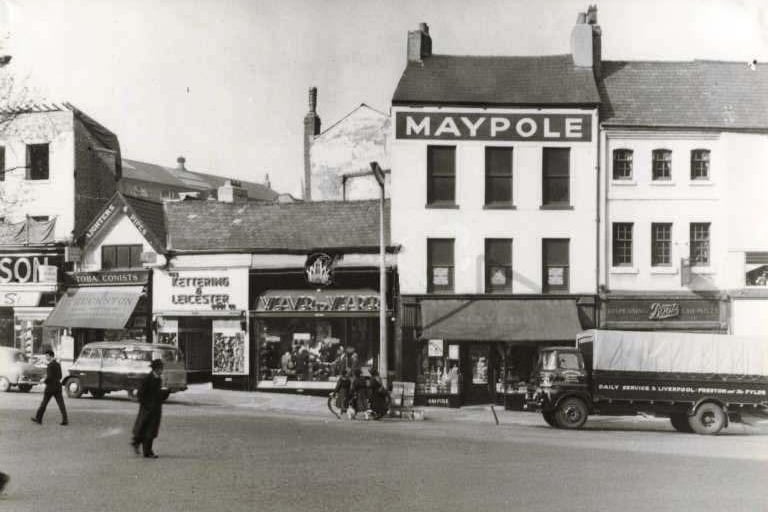 Cheapside, Preston 1960Maypole with Boots on the right. The three low roofed shops which now are occupied by Yates jewellers comprise the last survivors of the old buildings that used to stand on this street.