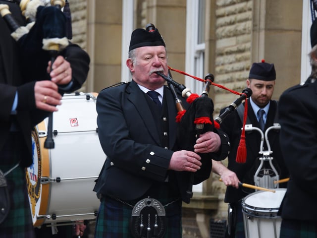 Members of the public lined the streets to watch the parade