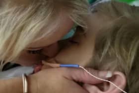 Hollie Dance with her son Archie Battersbee in hospital