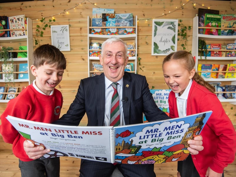 Balshaw Lane Community Primary School pupils Al Mellingwood and Ella Quinn get ready to read
