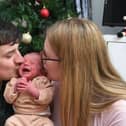 Noah-Scott Murphy, one of the first babies to be born on Christmas Day 2022, with parents Nicole McInnes and Ryan Murphy.