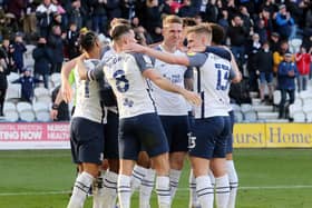 Preston North End players celebrate Emil Riis' match winning goal.