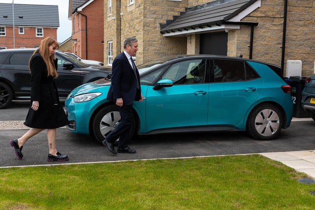 Labour leader Sir Keir Starmer visits a resident during a visit to a Leyland housing development with Deputy Leader Angela Raynor.  Photo: Kelvin Stuttard