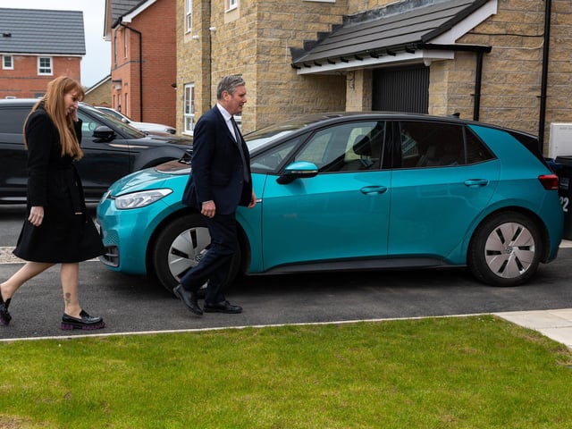 Labour leader Sir Keir Starmer visits a resident during a visit to a Leyland housing development with Deputy Leader Angela Raynor.  Photo: Kelvin Stuttard