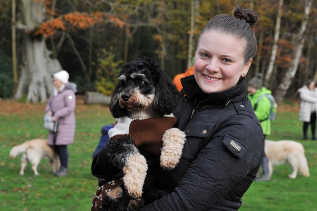 BLACKPOOL - 04-12-22  Dogs and their owners take part in Walkies for Wards, a festive dog walk raising funds for Blue Skies Hospital Funds, a charity for Blackpool Teaching Hospitals, held in the grounds of Lytham Hall, Lytham.  Claire Burrows with her dog Archie.