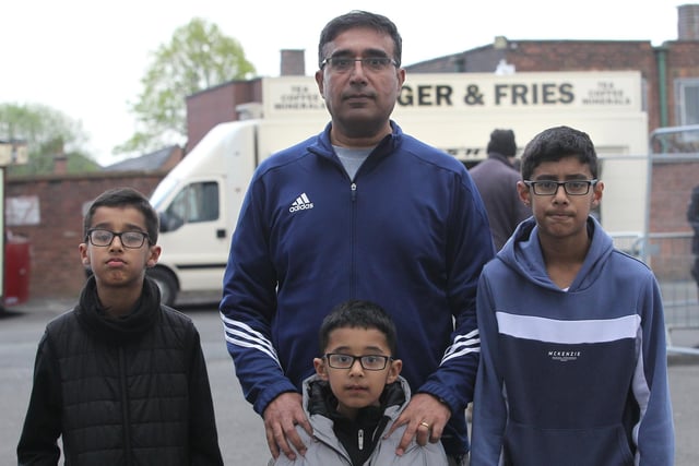 A family of PNE fans pose outside the ground.