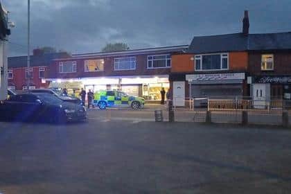 Police and paramedics were called to the scene outside Spar in Leyland Lane where a man in his 20s was stabbed at around 7.38pm. Picture by Richard Tattersall