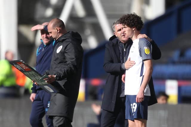 Mikey O'Neill gets instructions from Ryan Lowe before his Preston North End debut against Queens Park Rangers at Deepdale