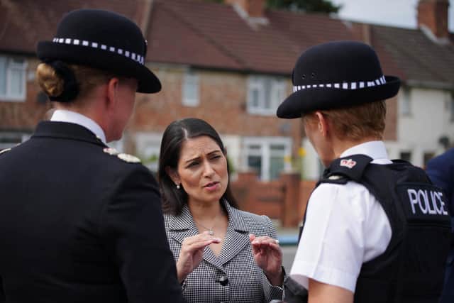 Home Secretary Priti Patel visits the scene in Kingsheath Avenue, Knotty Ash, Liverpool, where nine-year-old Olivia Pratt-Korbel was fatally shot (Credit: PA/ Peter Byrne)