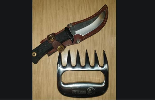 The meat claw and hunting knife seized when two men were arrested.