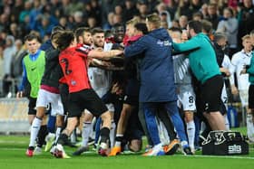 Tempers flare in the dying moments between Swansea City and Preston North End players and staff