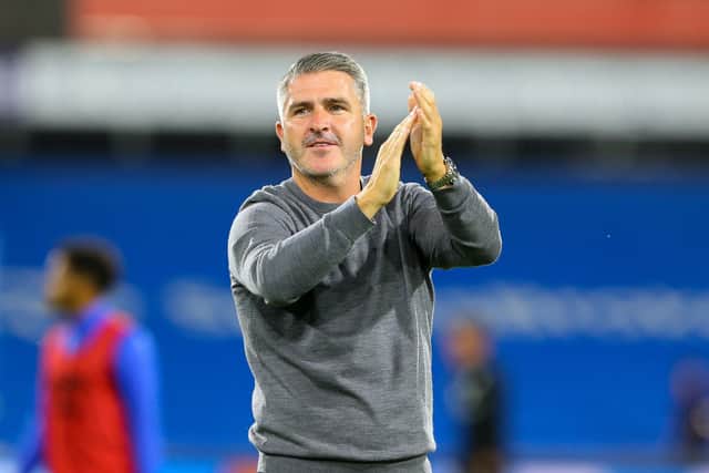 Ryan Lowe applauds the fans after his side's win against Huddersfield Town.