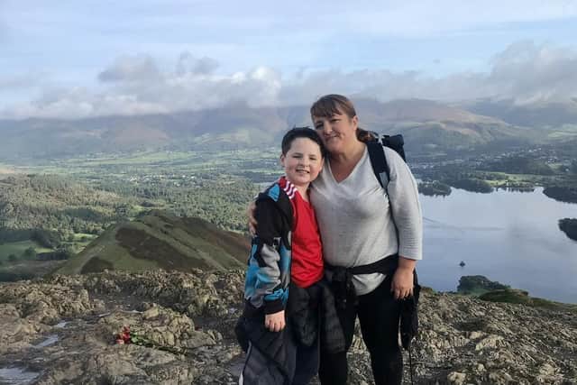 Luke Maughan  and his mum Helen in training for the walk